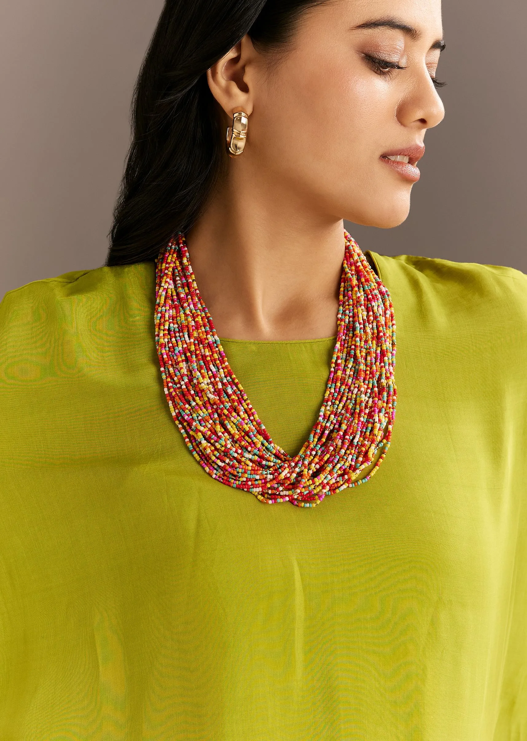 Green Asymmetrical Kurta Palazzo Set With Colorful Beaded Neckpiece